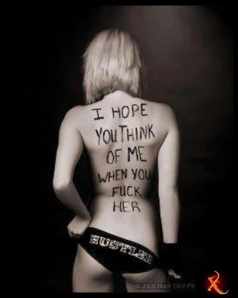topless woman with writing on back