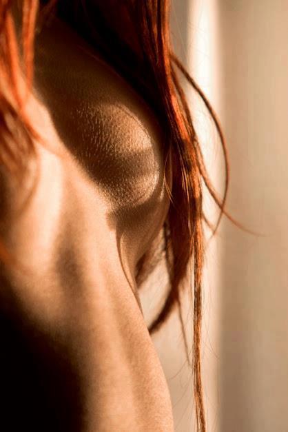 red hair covering her nipples